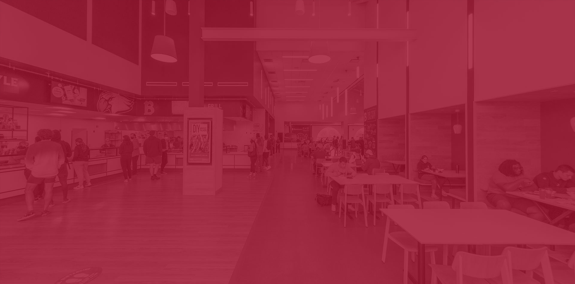 Dining Services - red overlay over a photo of the new Benny's cafeteria