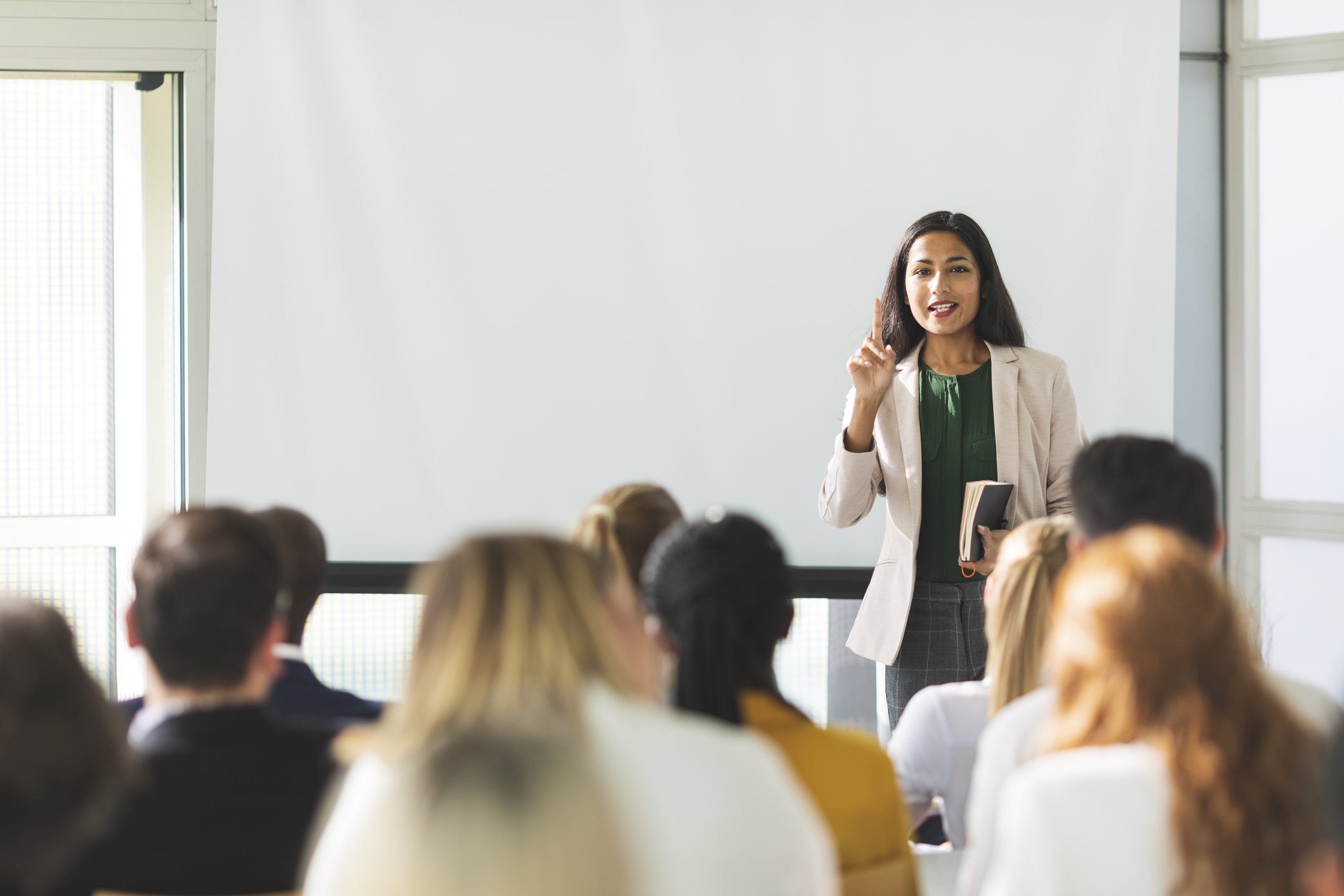 Businesswoman speaking at a seminar