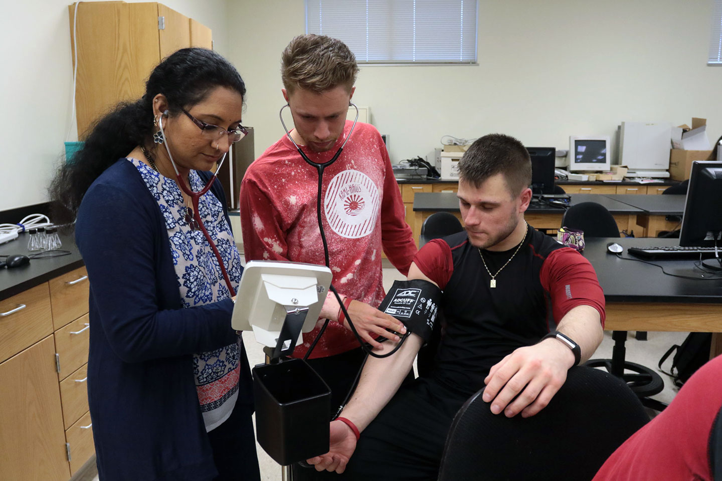 MSIP students taking blood pressure