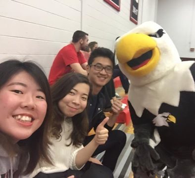 International students with Lisle mascot Ernie the Eagle