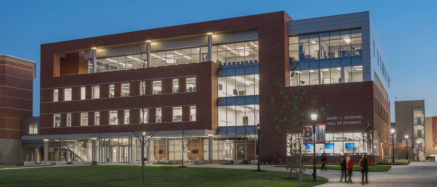 Goodwin Hall in the evening with all lights turned on inside building