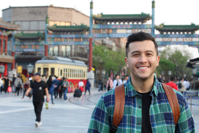 Male student with backpack in Chinese City