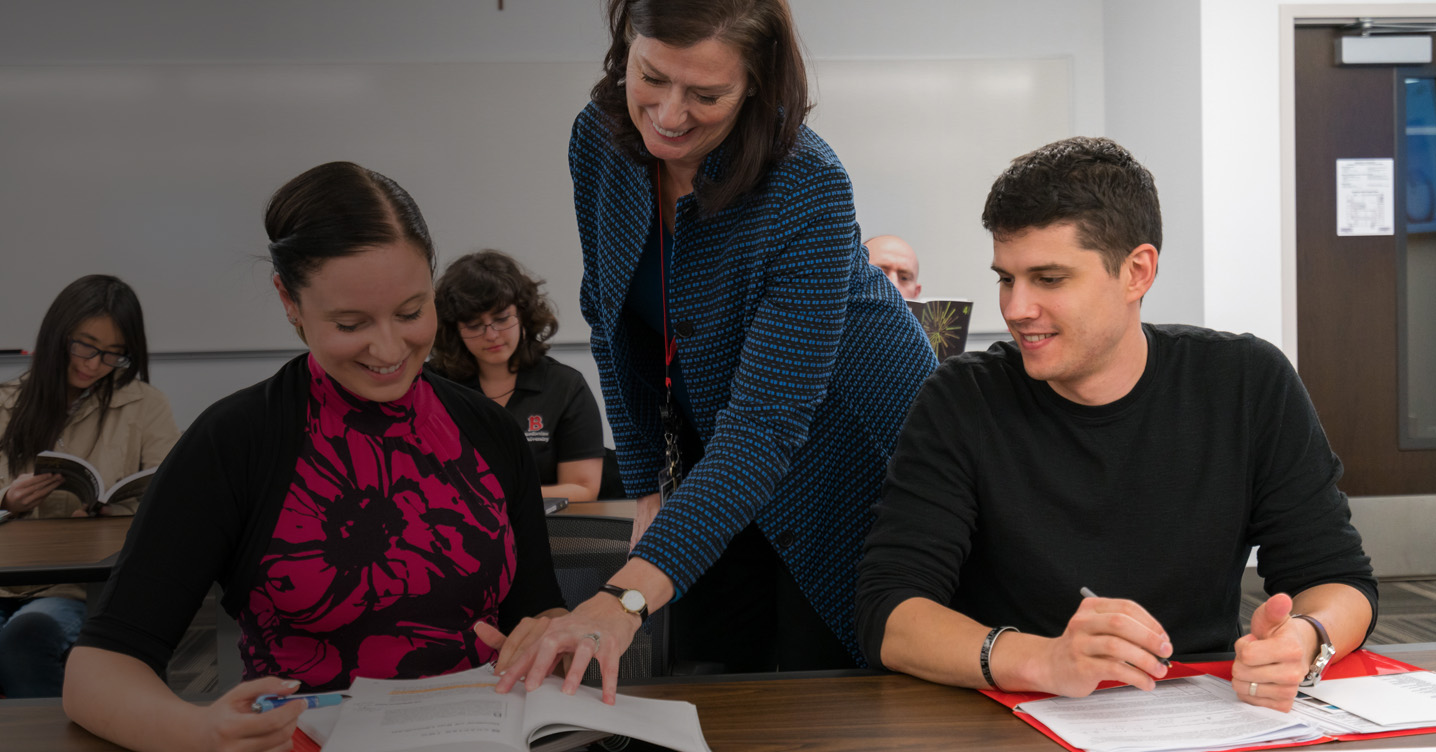 Professor Therese Yaeger working with students in her class