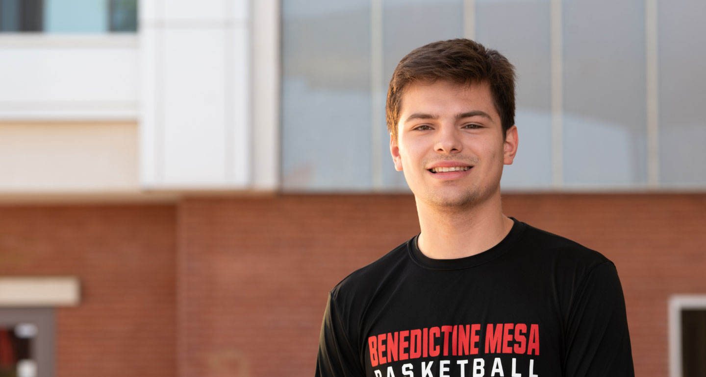 male student smiling on Mesa's campus; sport and exercise science