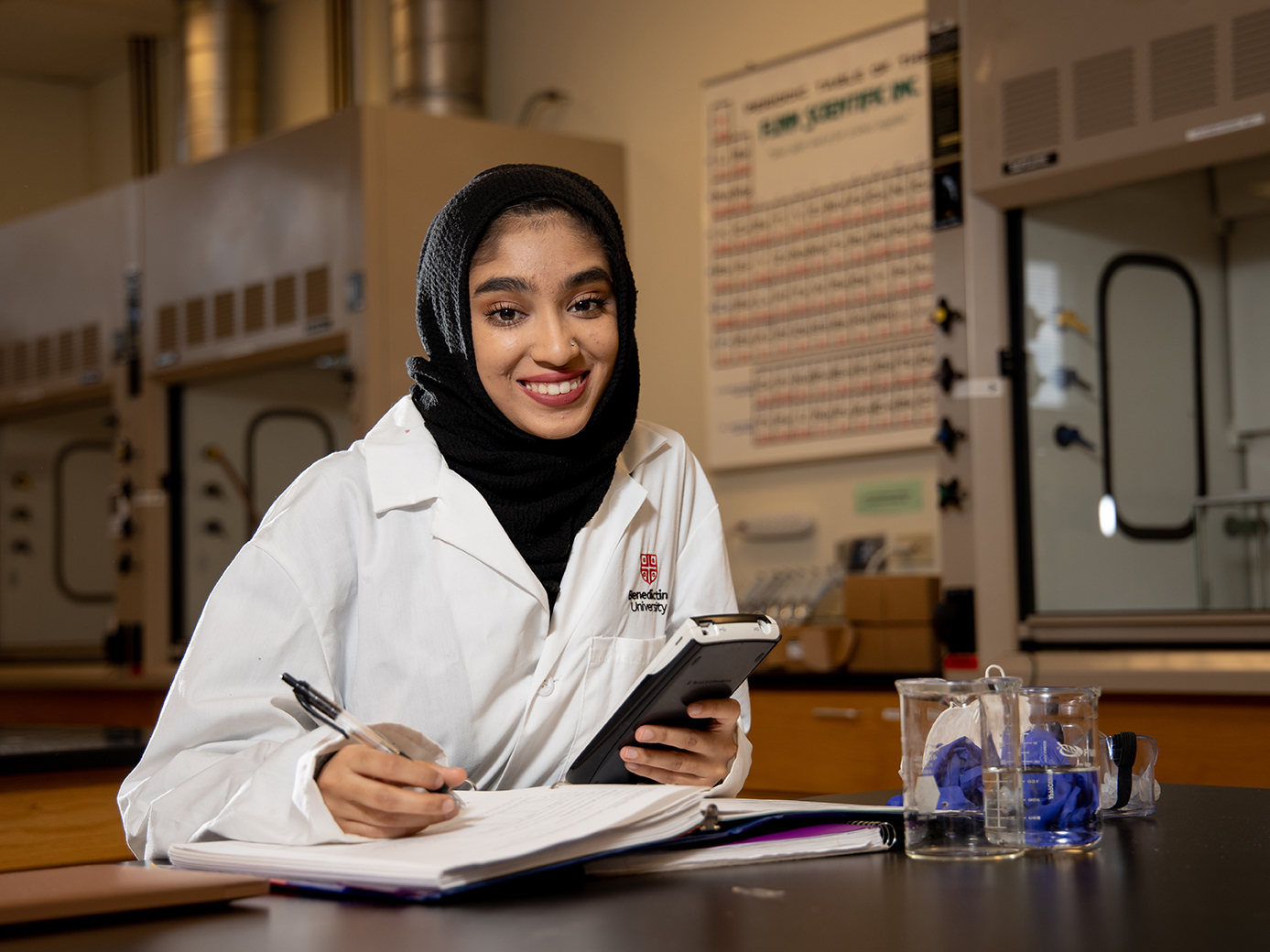 female science student in lab coat