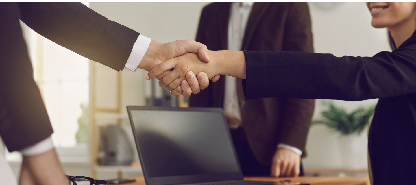 two business people shaking hands; entrepreneurship