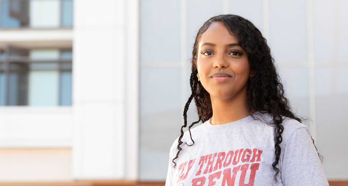 headshot of female student wearing BenU t-shirt smiling; Writing and Publishing