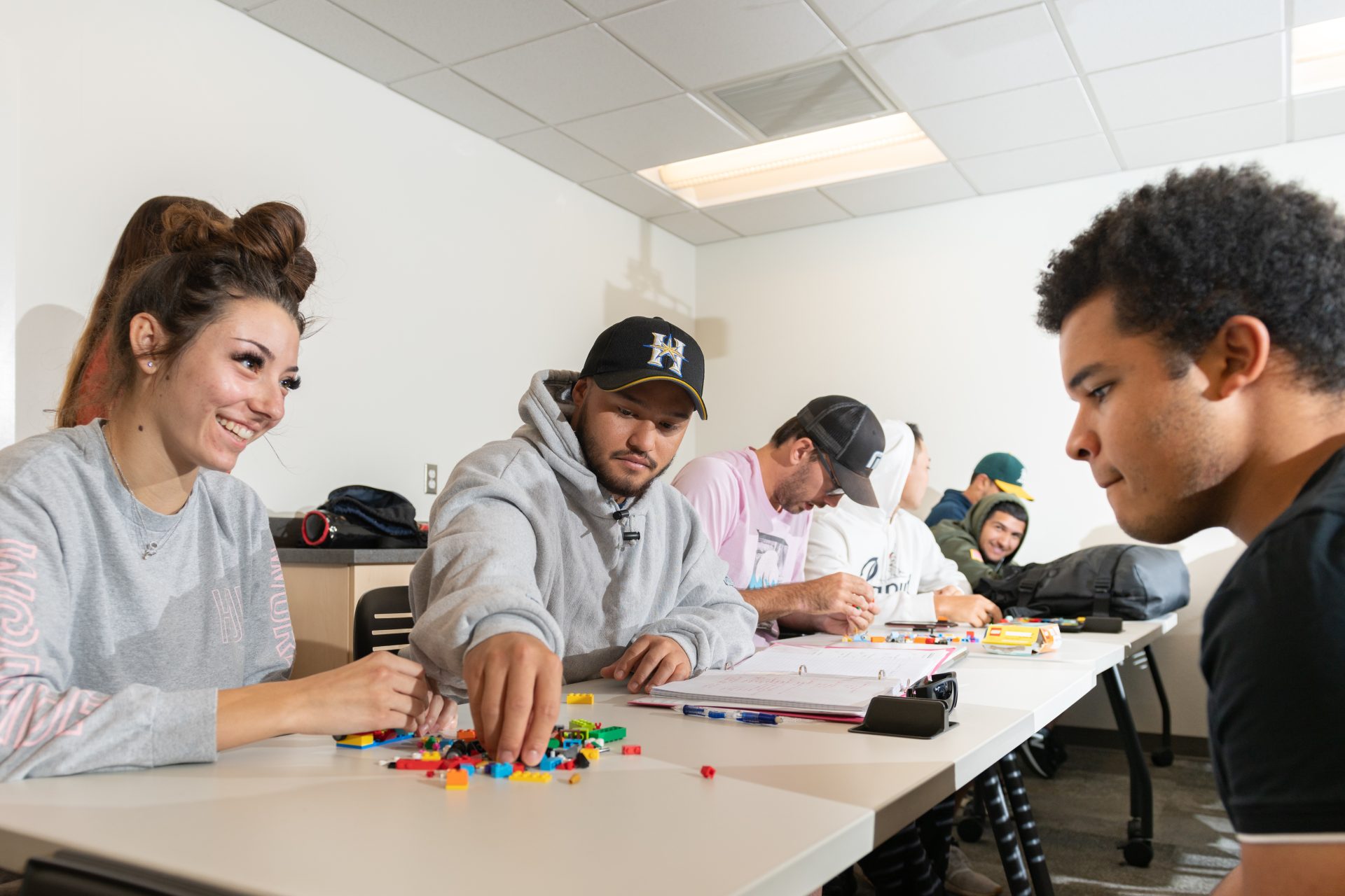 Male and female students working in class