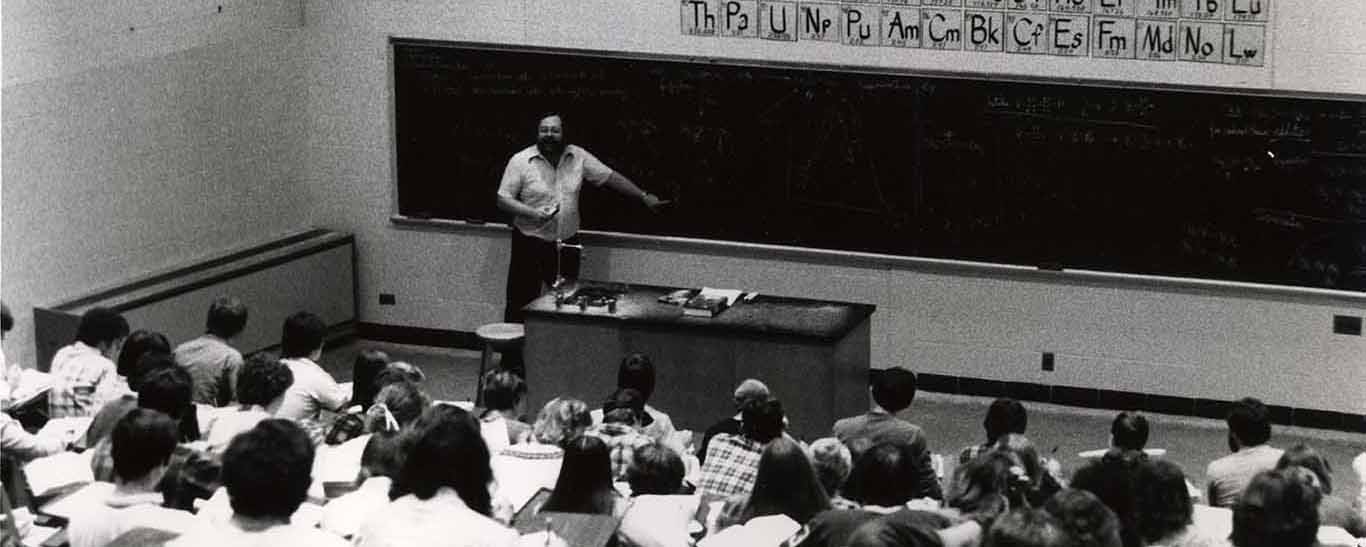 historic photo of professor Rausch teaching in Scholl lecture hall