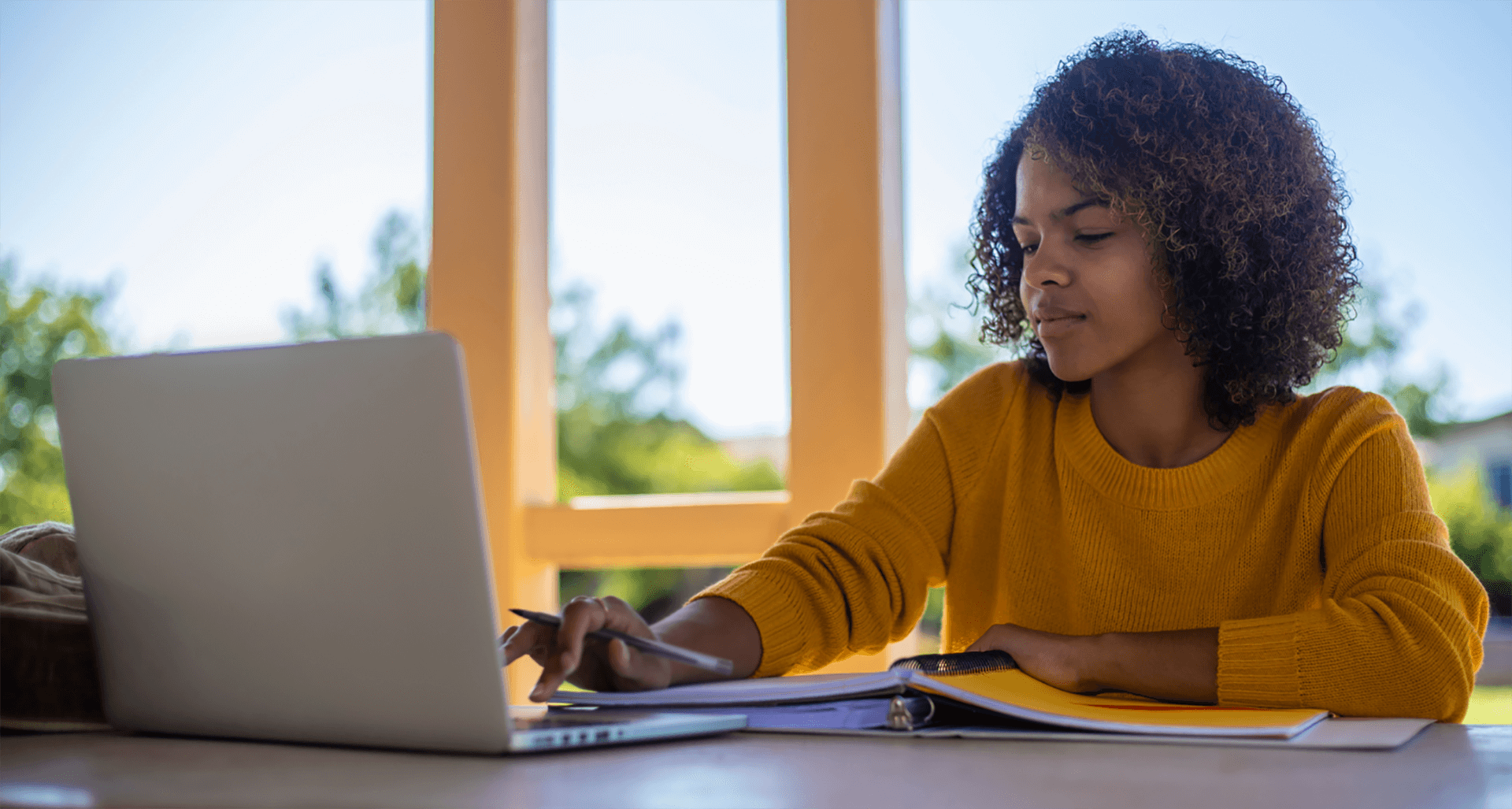 female student on laptop - computational sciences