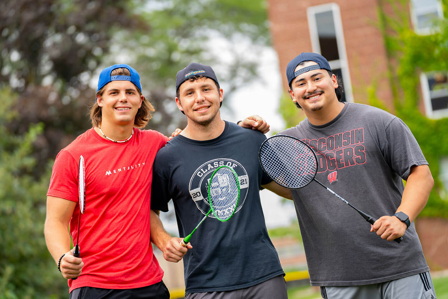 Freshmen boys playing badminton at BenU Carnival