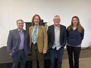 Image of BenU professors and panel