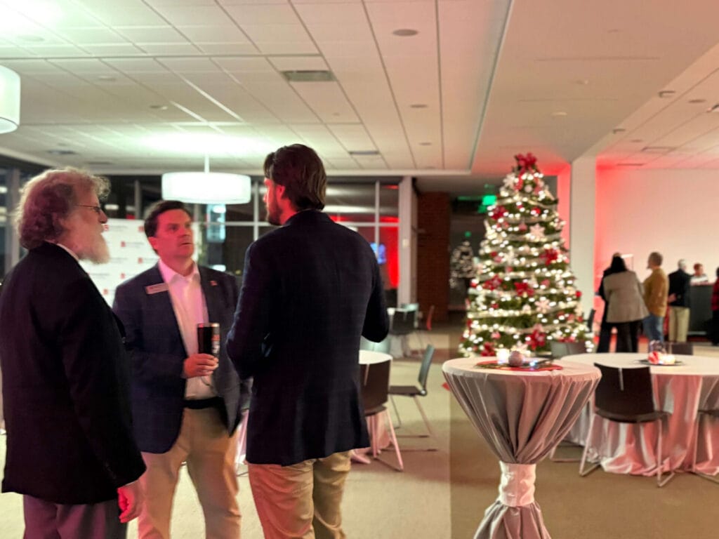 photo of guests at benedictine university for the president's circle holiday reception. multiple individuals were in attendance for this gathering