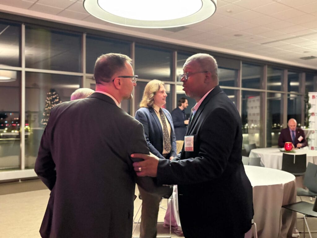 photo of guests at benedictine university for the president's circle holiday reception. multiple individuals were in attendance for this gathering