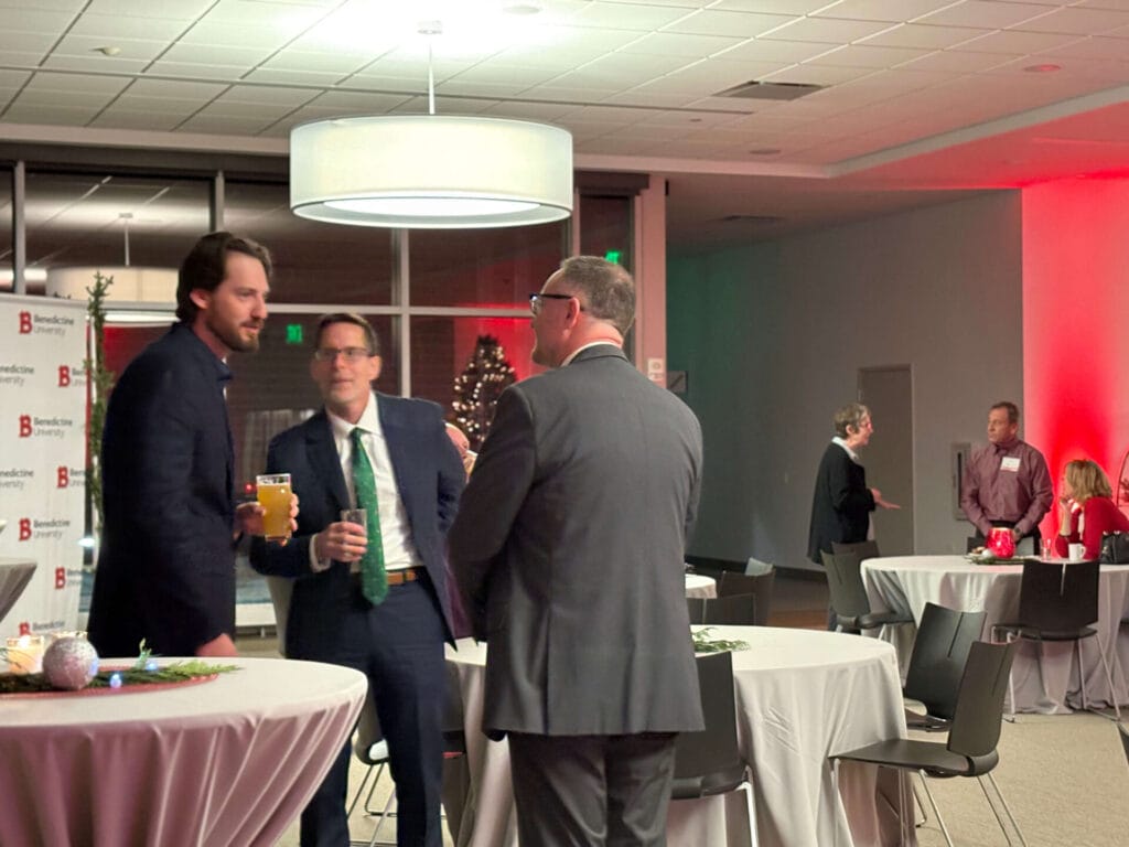 photo of guests at benedictine university for the president's circle holiday reception. multiple individuals were in attendance for this gathering