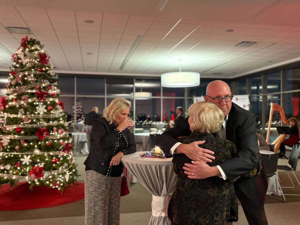 photo of guests at benedictine university for the president's circle holiday reception. multiple individuals were in attendance for this gathering