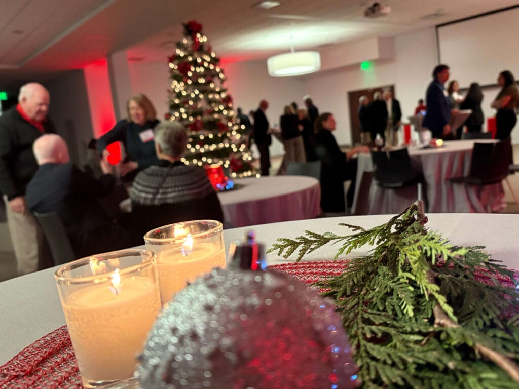 photo of guests at benedictine university for the president's circle holiday reception. multiple individuals were in attendance for this gathering