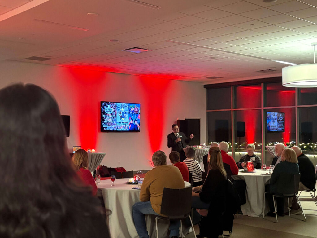 photo of guests at benedictine university for the president's circle holiday reception. multiple individuals were in attendance for this gathering