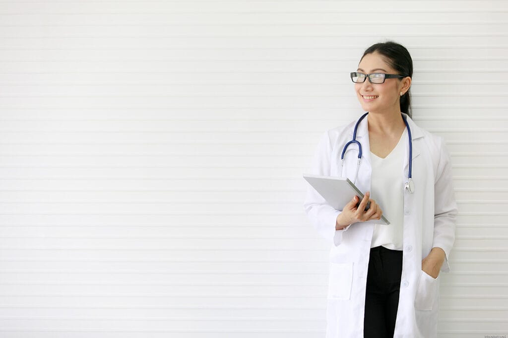 Woman doctor with stethoscope.