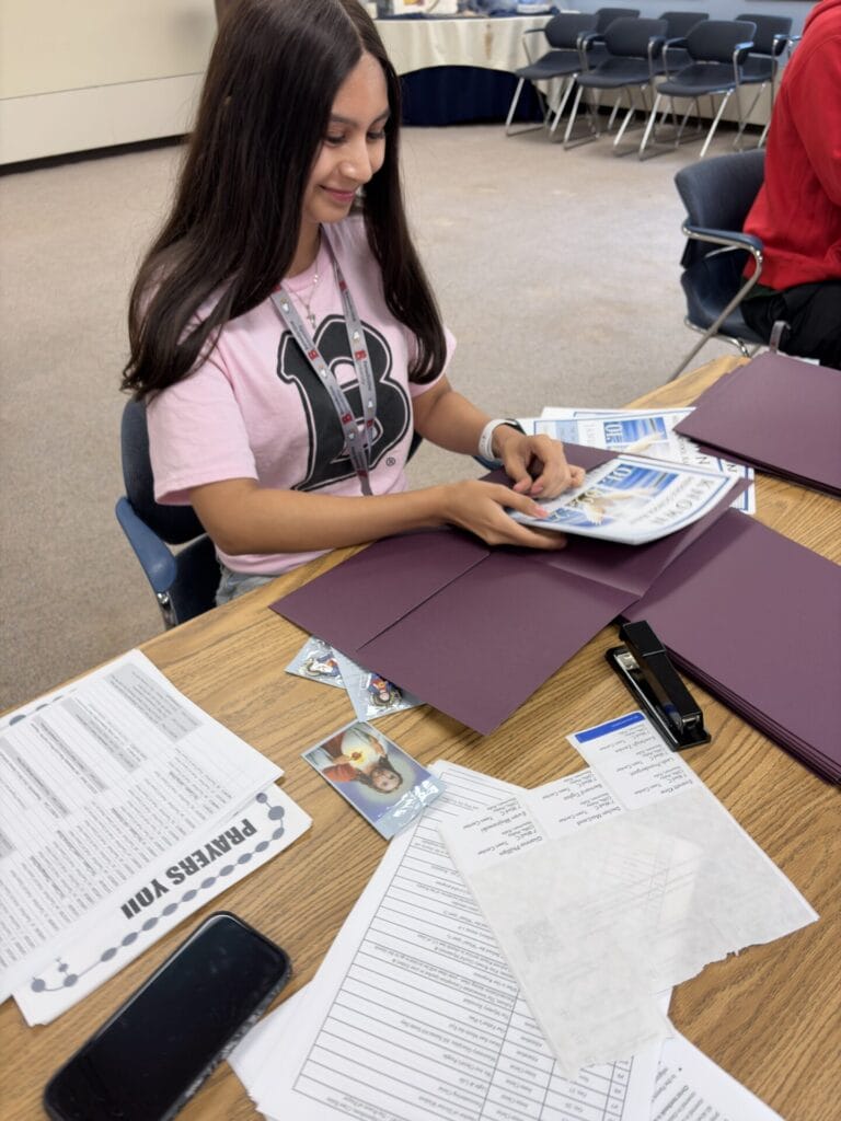 BenU Student Carla helping sort