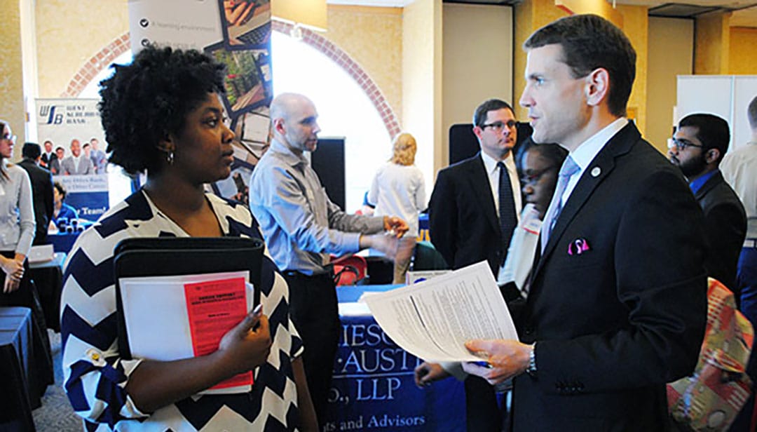 Job Fair - Employer speaking with student